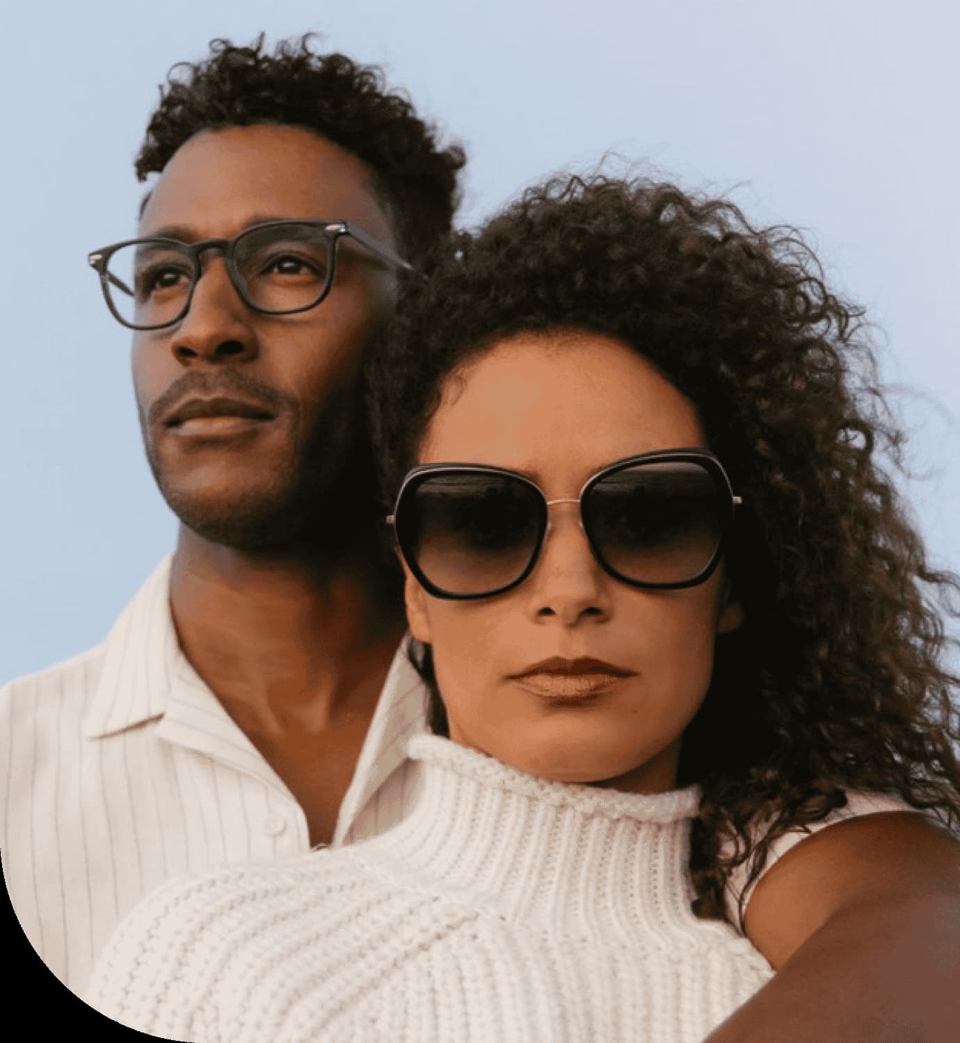 A stylish man and woman wearing fashionable eyewear, representing prestigious eyewear brands.